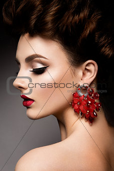 Beauty woman with blue eyes and red lips.
