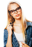 young pretty girl teenager in glasses on white isolated blond ha