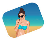Hot sexy tanned girl in sunglasses on a beach, portrait
