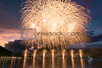 Fireworks on the Lugano Lake in summer night