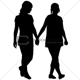 Silhouettes of lesbian couple holding hands