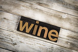 Wine Letterpress Word on Wooden Background