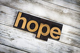 Hope Letterpress Word on Wooden Background