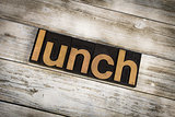 Lunch Letterpress Word on Wooden Background