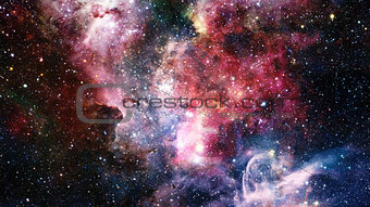 Open space with nebulae and galaxies. Elements of this image furnished by NASA