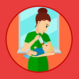 Mother holding and feeding baby with milk bottle