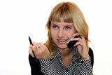 young woman with mobile phone is smiling in office