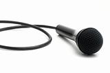 classic black microphone on white background