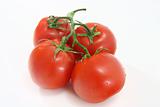 Bunch of red juicy tomatoes isolated on white