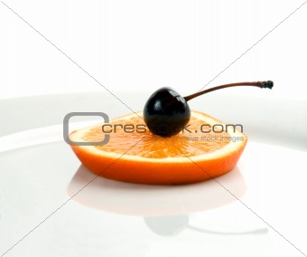 orange&cherry on a plate