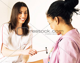 young smiling doctor examine patient, measuring pressure
