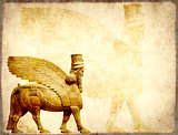 Grunge background with paper texture and lamassu