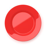 Empty red ceramic round plate isolated on white
