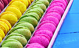 multicolored macaroon in a paper box