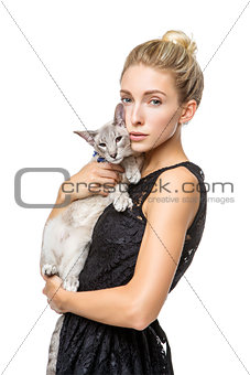 Beautiful girl with oriental siam cat