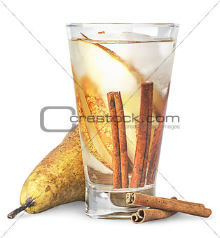 Pear and cinnamon in sweaty glass of lemonade