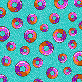 Vector seamless pattern with colorful glaze and sprinkles donuts.