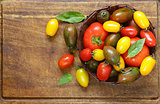 Ripe organic tomatoes in a wicker basket