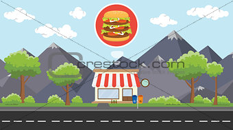 hamburger store business on beside street with mountain view as background