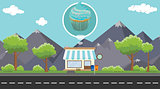 cupcakes store business on beside street with mountain view as background