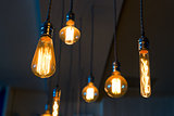 Old retro lamps hang from the ceiling