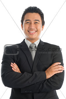Asian businessman arms crossed
