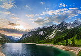 Alpine summer lake sunset panorama.