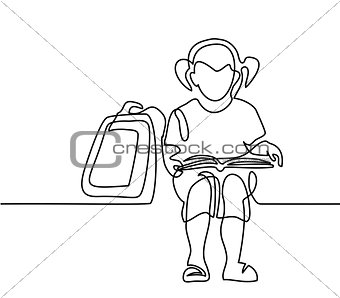 Girl reading book. Back to school concept.