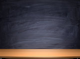 school desk and blackboard background