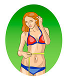 Fitness girl in bikini measuring her waist