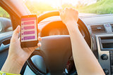 Driver keeps smartphone with correspondence