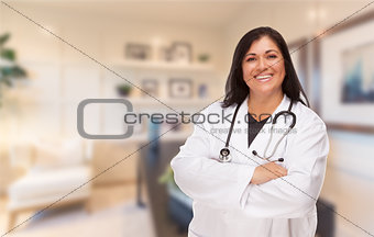 Female Hispanic Doctor or Nurse Standing in Her Office