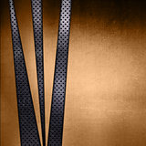 Abstract gold texture on a perforated metallic background