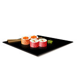 japanese cuisine: sushi on a plate with reflection