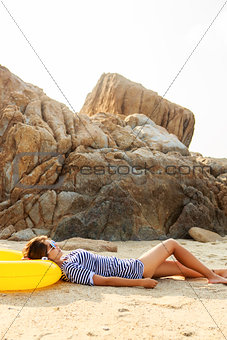 Sexy girl rest on the beach.