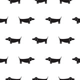 Dachshund dog silhouette seamless vector monochrome pattern.