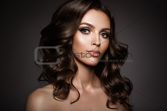 Beautiful young brunette with make-up
