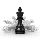 Black king standing over fallen black chess pieces