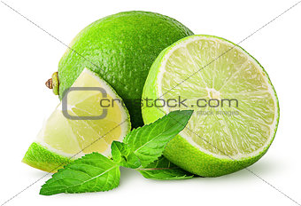 Whole and few pieces of lime with mint