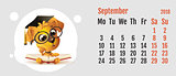 2018 year of yellow dog on Chinese calendar. Fun dog reading book. Calendar grid month September
