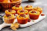 Homemade muffins of pumpkin with pecans.