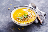 Spicy pumpkin soup with basil