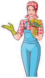 Beautiful young woman gardener holding pot of flowers