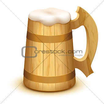 Full wooden beer mug with thick white foam