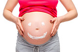 smile on belly of pregnant woman, photo close up isolated