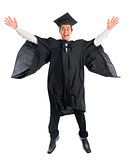 Graduate university student jumping high