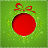 Abstract Christmas balls cutted from paper on green background. 