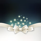 Holiday light Christmas background with white silk bow