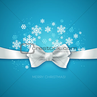 Blue Christmas background ribbon with white silk bow