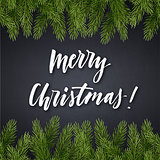 Christmas hand lettering on a dark background with a decoration of fir branches. Vector background design.